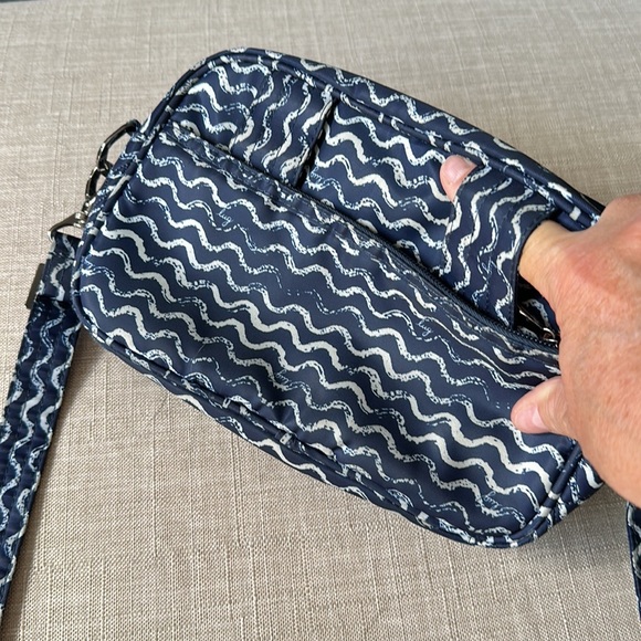 Lightly used Lug Carousel crossbody bag. Adjustable strap expands up to 26”. - Picture 5 of 6